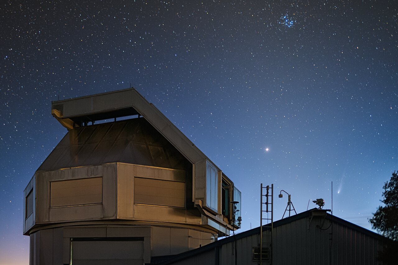 The WIYN 3.5m telescope dome at Kitt Peak National Observatory under a star-filled sky